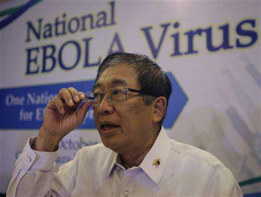 Philippine Health Secretary Enrique Ona addresses the media on the sidelines of the National Summit on Ebola Virus Disease (EVD) where he announced that the Philippines is considering sending Filipino health volunteers to Ebola-affected countries in West Africa Friday, Oct. 10, 2014 at suburban Mandaluyong city east of Manila, Philippines. Hundreds of health experts, NGOs (Non-Government Organizations), private sectors attended the summit to be prepared for a multi-sectoral response for EVD which he termed as "a health emergency of international concern." (AP Photo/Bullit Marquez)