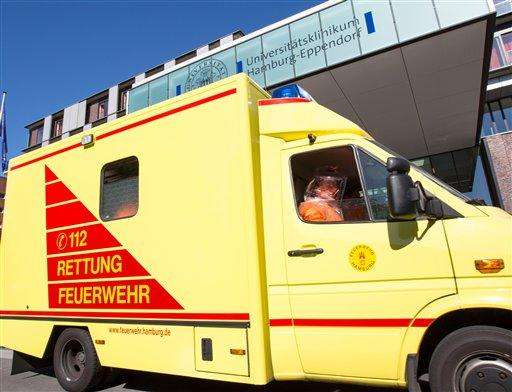  
              A man in special protection  suit sits in an ambulance in front of the entrance of Eppendorf hospital in Hamburg, Germany, Wednesday Aug.  27, 2014. Officials say an epidemiologist who was infected with Ebola while working for the World Health Organization in Sierra Leone has arrived in Germany for treatment. Hamburg health department spokesman Roland Ahrendt said Wednesday the doctor would be treated in the city’s UKE hospital at WHO’s request. WHO spokeswoman Fadela Chaib said the patient is a man from Senegal who was working for the WHO as a consultant when infected by the virus in Sierra Leone. To date, the WHO says more than 240 health care workers have developed the disease in Guinea, Liberia, Nigeria and Sierra Leone, and more than 120 have died. (AP Photo/dpa,Georg Wendt)
             