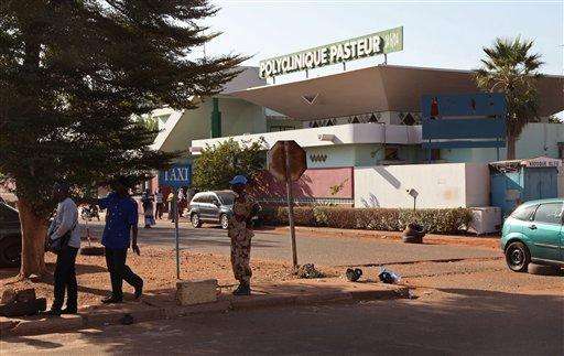  
              A outside view of the Polyclinique Pasteur clinic where a nurse is suspected of dying from the Ebola virus in the city of Bamako, Mali Wednesday, Nov. 12, 2014. Malian authorities on Wednesday reported two new deaths from Ebola that are not believed to be linked to the nation's only other known case, an alarming setback as Mali tries to limit the epidemic ravaging other countries in the region. (AP Photo/Baba Ahmed)
             