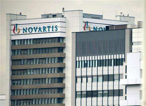  
              FILE - This Oct. 25, 2011 file photo shows the logo of Swiss pharmaceutical company Novartis AG on one of their buildings in Basel, Switzerland. Novartis AG has posted a 45 percent rise in net profit in the third quarter, boosted by strong sales of new products such as Gilenya for multiple sclerosis and the leukemia drug Tasigna as they announced Tuesday, Oct. 28, 2014. The Basel, Switzerland-based company's reported quarterly net profit was US dollar 3.24 billion, up from last year's equivalent of US dollar 2.23 billion, which was downwardly adjusted to conform to reporting requirements. (AP Photo/Keystone, Georgios Kefalas, File)
             