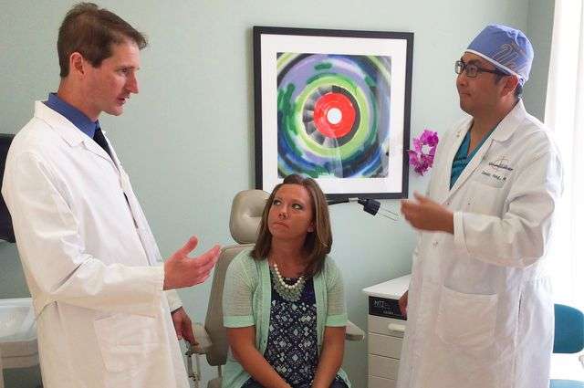 UCLA patient Rachel Pyne listens to her surgeons Dr. Quinton Gopen and Dr. Isaac Yang discuss her second surgery to patch a small hole in her inner ear. (Source: UCLA)