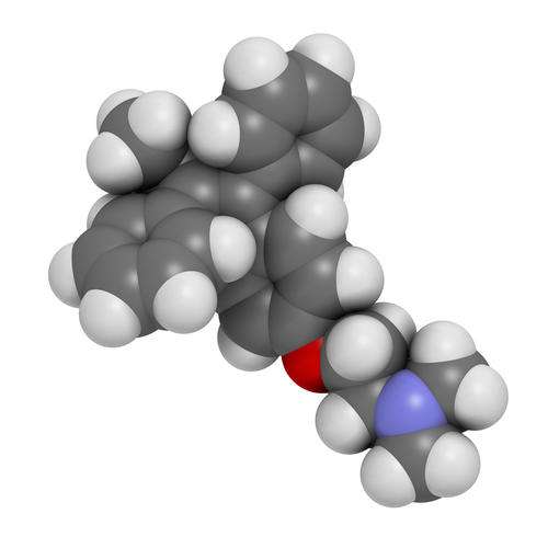   Tamoxifen breast cancer drug, chemical structure. Atoms are represented as spheres with conventional color coding: hydrogen (white), carbon (grey), oxygen (red), nitrogen (blue)