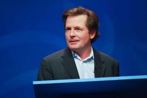 Actor Michael J. Fox delivers an address to IBM Lotusphere 2012 conference on January 16, 2024 in Orlando, Florida. He tells how social networks help him fight his Parkinson disease. Source: Shutterstock